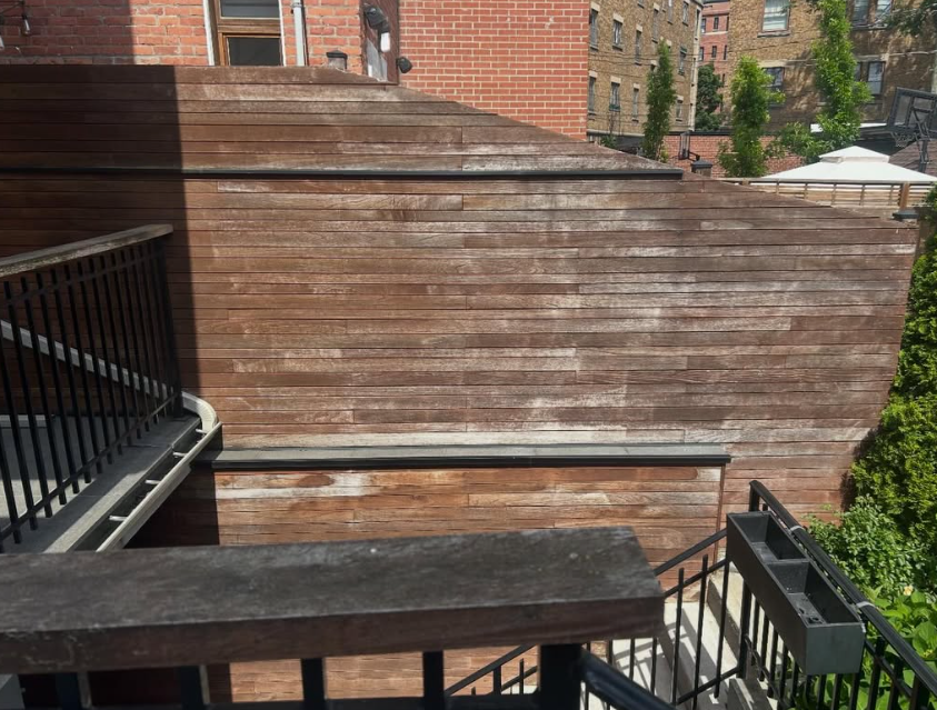 Exterior wood staining project — wood-clad wall